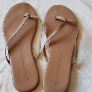 LC tan flip flops - size 7